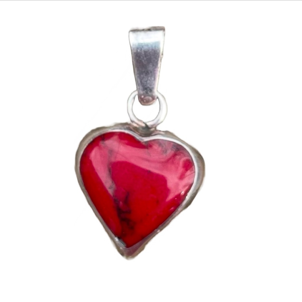 Red Howelite Heart pendant Also known as red Turquoise. Free SS chain with offer